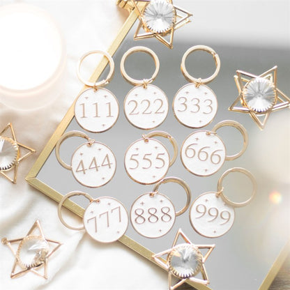 Set of 36 Angel Number Keyrings on Display